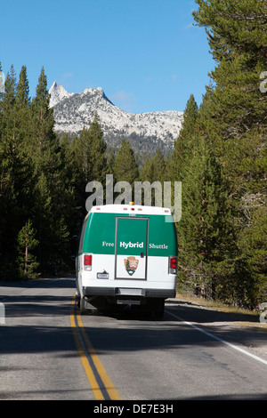 Free transportation on a hybrid shuttle bus service running in Yosemite National parks Tuolumne Meadows Stock Photo