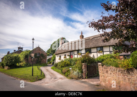 Burton a village on the Wirral Peninsula. Thatched cottage Stock