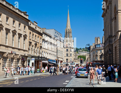 Looking up Bath High street towards St Michaels church Bath city centre center Bath Somerset England UK GB EU Europe Stock Photo