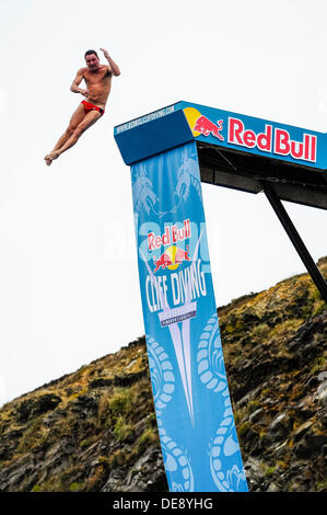 St Davids, Wales. 13th Sep, 2013. Blake Aldridge of Great Britain (GBR) dives during Round 1 on day 1 of the Red Bull Cliff Diving World Series from the Blue Lagoon, Pembrokeshire, Wales. This is the sixth stop of the 2013 World Series and only the second time the event has visited the UK. The competitors perform dives into the sea from a specially constructed 27 metre high platform. Credit:  Action Plus Sports/Alamy Live News Stock Photo