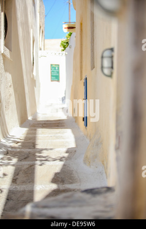 Empty beautiful street in a small town on Santorini, Greece