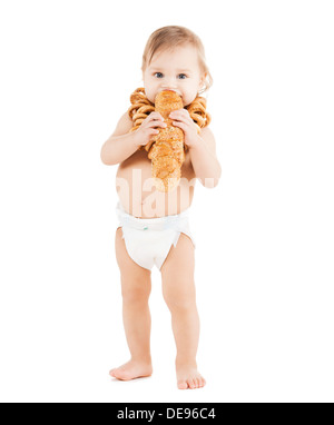 cute todler eating long bread Stock Photo