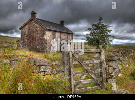 Nun's Cross Farm 'Ditsworthy Warren House', is an isolated, derelict old farmhouse near Princetown on Dartmoor Stock Photo