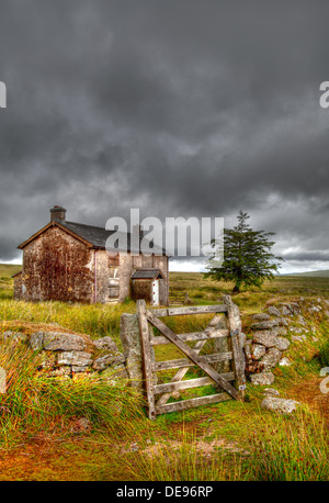 Nun's Cross Farm 'Ditsworthy Warren House', is an isolated, derelict old farmhouse near Princetown on Dartmoor Stock Photo