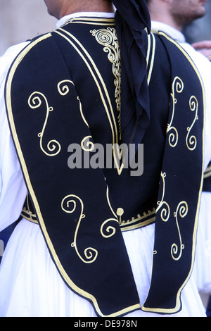 Members of the folk group Rizes in Greek national costume during the 47th Folklore Festival in Zagreb, Croatia on July 19,2013 Stock Photo