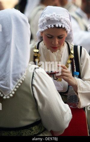 Members of the folk group Rizes in Greek national costume during the 47th Folklore Festival in Zagreb, Croatia on July 19,2013 Stock Photo