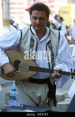 Members of the folk group Rizes in Greek national costume during the 47th Folklore Festival in Zagreb, Croatia on July 19,2013 Stock Photo