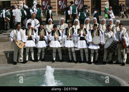 Members of the folk group Rizes in Greek national costume during the 47th Folklore Festival in Zagreb, Croatia on July 19,2013 Stock Photo