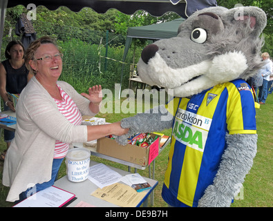 Warrington Wolves Mascot Wolfie at Grappenhall Walking Day, Community Library stall, Warrington, Cheshire,England,UK Stock Photo