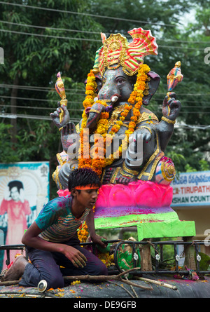 Lord Ganesha statue on top of a rickshaw. Ganesha Chaturthi Festival,  Puttaparthi, Andhra Pradesh, India Stock Photo