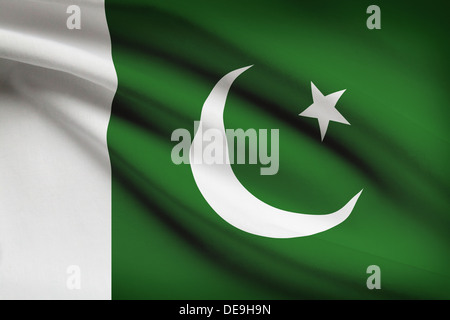 Pakistani flag blowing in the wind. Part of a series. Stock Photo