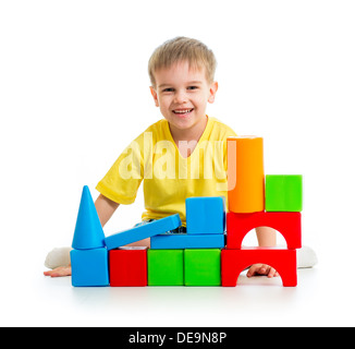 kid playing with building blocks Stock Photo