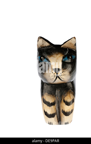 Wood carved statuette of a black kat in close up and isolated in white Stock Photo