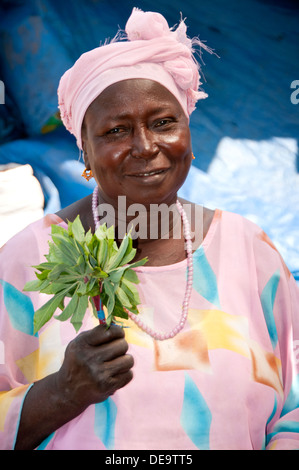 Gambian Woman Selling Herbs, Serrekunda Market, The Gambia, West Africa Stock Photo