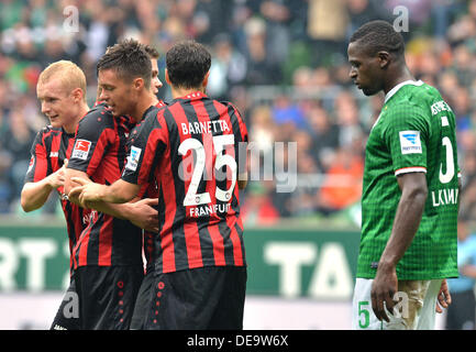 Bremen, Germany. 14th Sep, 2013. Frankfurt's Sebastian Rode (L), Stefan Aigner (R) and Tranquillo Barnetta celebrate Vaclac Kadlec's (2-L) 0-2 goal during the German Bundesliga match between Werder Bremen and Eintracht Frankfurt at Weser Stadium in Bremen, Germany, 14 September 2013. Photo: CARMEN JASPERSEN/dpa/Alamy Live News Stock Photo