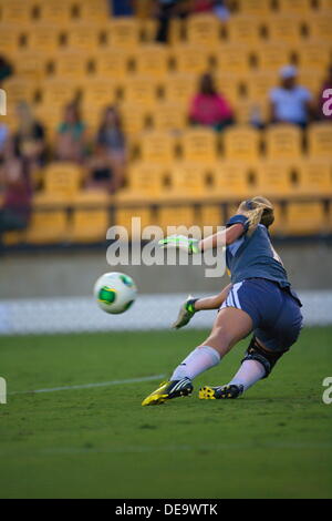 Kennesaw, Georgia.  USA.   September 13, 2013.   KSU goalie Olivia Sturdivant makes a diving stop during Ole Miss' 2-1 win over Kennesaw State at Fifth Third Bank Stadium.  Women's NCAA Division I Soccer. Stock Photo