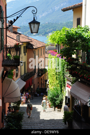 Italy - Lake Como - Bellagio - the Salita Serbelloni - colourful shops bars  restaurants - narrow stepped street from lakeside Stock Photo