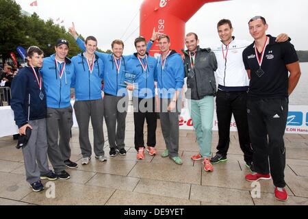 Hamburg, Germany. 14th Sep, 2013. Germany's team celebrate coming in firest during the Altercup 270 meter sprint rowing competition in Hamburg, Germany, 14 September 2013. Germany came in firest past the USA and Poland. Photo: BODO MARKS/dpa/Alamy Live News Stock Photo