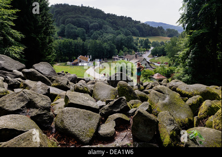 Visitors at  Felsenmeer (Sea of rocks) near Lautertal-Reichenbach in Forest of Odes, Hesse, Germany Stock Photo