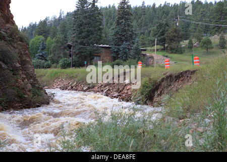 Evergreen, CO USA.  14 Sept, 2013. Portions of Highway 74 into Evergreen are in danger of being washed away due to the flood waters.  Evergreen is expected to receive more rain through Sunday. © Ed Endicott  Alamy Live News Stock Photo
