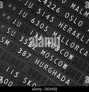 Airport departure display board background Stock Photo