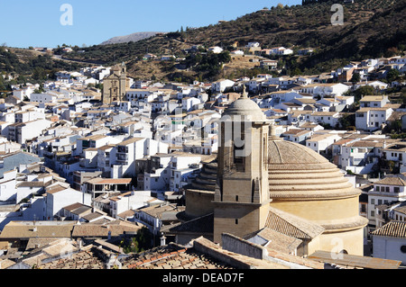 View over the town rooftops with the San Antonio church in the foreground, Montefrio, Granada Province, Andalusia, Spain.