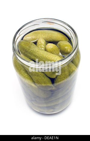 Pickled cucumbers in jar isolated on white Stock Photo