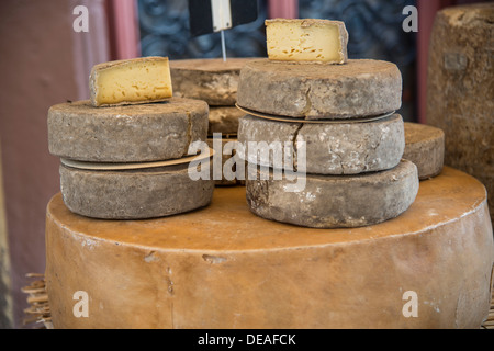 Cheeses for sale on a market, Ribeauville, Département Bas-Rhin, Alsace, France Stock Photo