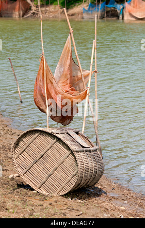 Fish trap made of bamboo and a fishing net on the Sangkae river,  Battambang, Cambodia, Southeast Asia Stock Photo - Alamy