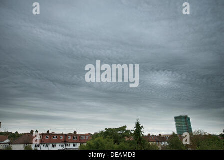 South West London, UK. 15 September 2013. After a sunny start, grey clouds gradually rolled in today from the north with some unusual formations seen in darkening skies heralding the first storm of Autumn. Credit:  Malcolm Park editorial/Alamy Live News Stock Photo