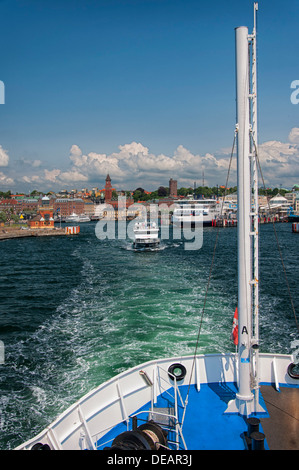 A passenger ferry leaves Helsingborg in Sweden on its way to Helsingor in Denmark. Stock Photo