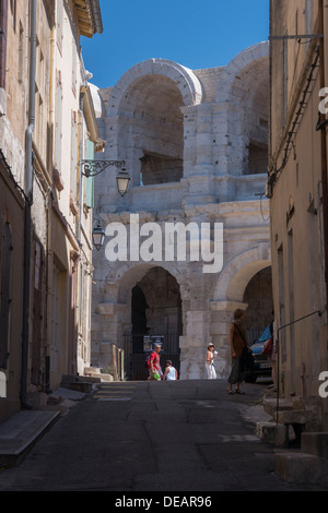 The Roman amphitheatre at the end of the street, Arlès, Provence, France Stock Photo