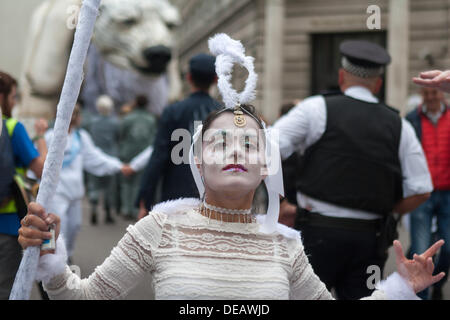 London, UK. 15 September 2013. Greenpeace take world's largest polar bear puppet in parade to Shell Oil's London HQ.  Credit:  martyn wheatley/Alamy Live News Stock Photo