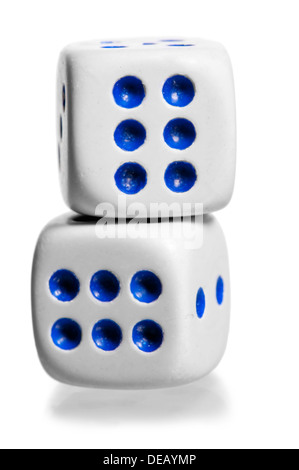 two white dice stand by each other on a white background Stock Photo