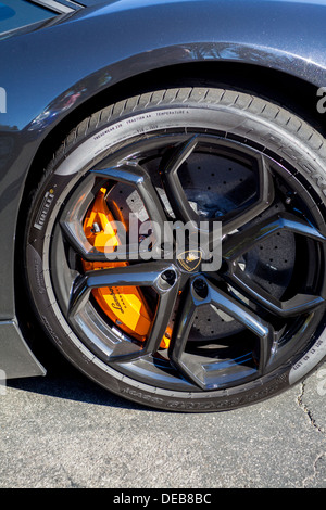 A front wheel, tire, brake rotor and caliper on a Lamborghini at Supercar Sunday in Woodland Hills California Stock Photo
