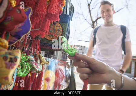 Young couple looking at souvenirs. Stock Photo