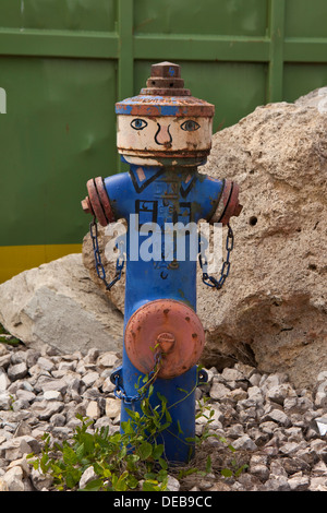 A funny painting of a fire hydrant water outlet in Germany Stock Photo