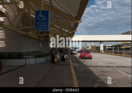 Orlando International Airport Curbside Handicap accessible Loading zone Stock Photo