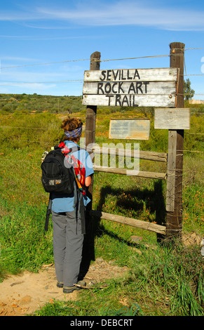 Visitor at the entrance to the Sevilla Rock Art Trail, site of prehistoric rock paintings of the Bushmen, Cederberg Mountains Stock Photo