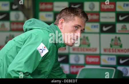 Bremen, Germany. 14th Sep, 2013. Werder's Nils Petersen has to sit on the bench before the Bundesliga soccer match Werder Bremen vs Eintracht Frankfurt at the Weser Stadion in Bremen, Germany, 14 September 2013. Werder Bremen loses 0-3. Photo: CARMEN JASPERSEN/dpa/Alamy Live News Stock Photo