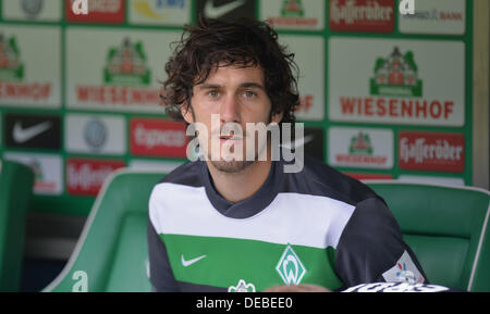 Bremen, Germany. 14th Sep, 2013. Werder's Santiago Garcia sits on the bench before the beginning of Bundesliga soccer match Werder Bremen vs Eintracht Frankfurt at the Weser Stadion in Bremen, Germany, 14 September 2013. Werder Bremen loses 0-3. Photo: CARMEN JASPERSEN/dpa/Alamy Live News Stock Photo