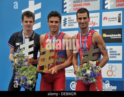 London, UK. 15th Sep, 2013. World Champion Javier Gomez, centre, Jonathan Brownlee, left and Mario Mola. 1st, 2nd and 3rd respectively. PruHealth World Triathlon Grand Final. Hyde Park. London. 15/09/2013. © Sport In Pictures/Alamy Live News Stock Photo