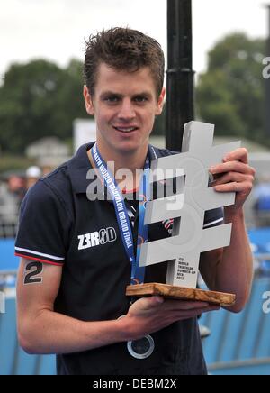 London, UK. 15th Sep, 2013. Jonathan Brownlee with his trophy for being 2nd in the world. PruHealth World Triathlon Grand Final. Hyde Park. London. 15/09/2013. © Sport In Pictures/Alamy Live News Stock Photo