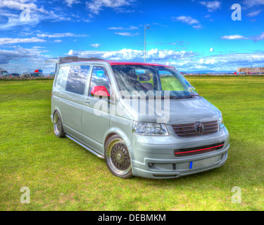 Volkswagen VW T5 van alloy wheels and blue sky in HDR Stock Photo