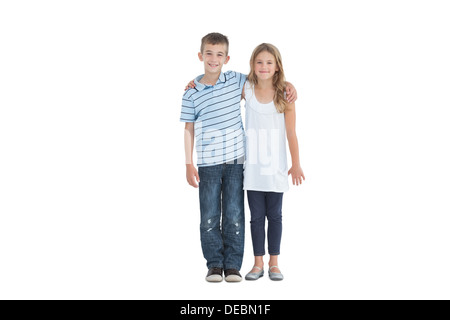 Young brother and sister holding each other Stock Photo
