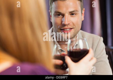 Happy couple having dinner together Stock Photo