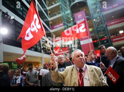 Berlin, Germany. 15th Sep, 2013. SPD-supporters react to the first computer predictions for the state elections in Bavaria at the SPD party headquarters in Berlin, Germany, 15 September 2013. Photo: KAY NIETFELD/dpa/Alamy Live News Stock Photo