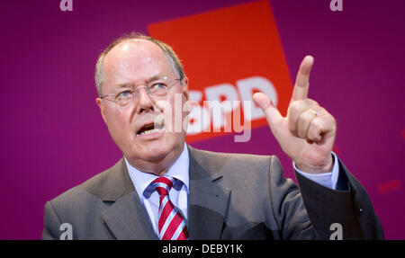 Berlin, Germany. 15th Sep, 2013. SPD chancellor candidate Peer Steinbrück speaks to party supporters after the first computer predictions for the state elections in Bavaria at the SPD party headquarters in Berlin, Germany, 15 September 2013. Photo: KAY NIETFELD/dpa/Alamy Live News Stock Photo