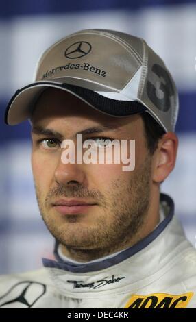 Oschersleben, Germany. 15th Sep, 2013. The British Mercedes-pilot Gary Paffett photographed after the 8th race of the DTM at the etropolis Motorsport Arena in Oschersleben, Germany, 15 September 2013. Photo: JENS WOLF/dpa/Alamy Live News Stock Photo