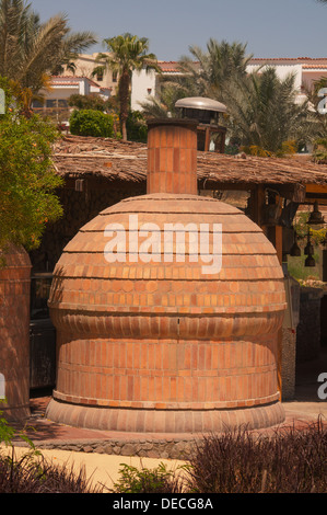 open air stove from red bricks in Egypt hotel Stock Photo